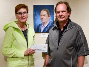 Malvina James pictured with Mayor Gord Macleod is presented with an award of $500 for winning Portrait Artist of the Year for her painting of the Mayor.