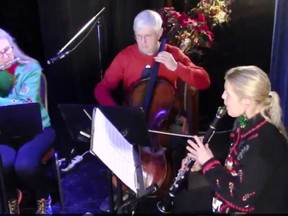 Two Thirds Down Under performed numerous instrumental pieces at the Christmas at the Royal concert livestreamed on December 18 and 20 by the Kingston Musicians’ Union. L-r, Sue Susie Moore, Ian Moore, and Alison Josselyn  Supplied by the Royal Theatre