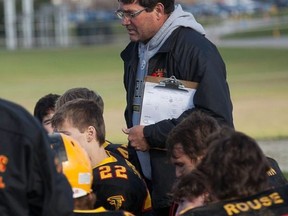 Barry Boley, right, while coaching the OSCVI Falcons football team in 2015. (JOHN FEARNALL)