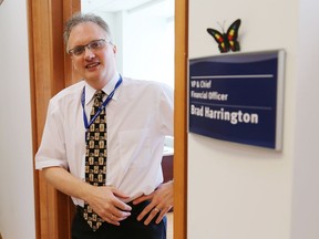 Quinte Health Care vice-president and chief financial officer Brad Harrington stands in the doorway of his office at Belleville General Hospital in August. He's leaving in early 2021 for a similar job at Markham Stouffville Hospital.