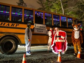 A drive-thru Christmas party, sponsored by the Rotary Club of Brantford, was held Sunday for clients served by the Lansdowne Children's Centre in conjunction with the Brantford Lights at Glenhyrst. Photo by Nicolas Oulton