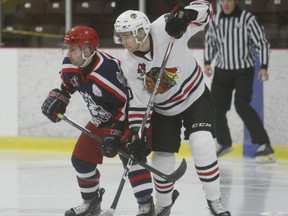 Sam Gaudreau (left) of the Colts and Colin Stacey of the Braves position themselves for the opening faceoff during the Cornwall-Brockville developmental scrimmage at the Memorial Centre in December. File photo/The Recorder and Times
