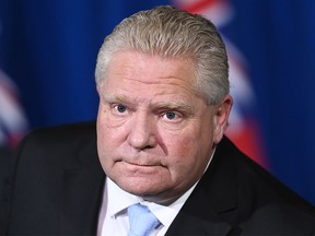 Ontario Premier Doug Ford holds a press conference at Queen's Park during the COVID-19 pandemic in Toronto on Monday, December 21, 2020.