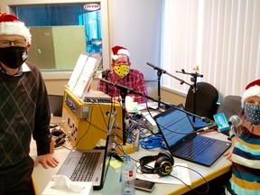 Retired Bayshore Broadcasting general manager Ross Kentner, left, with Country 93 morning hosts Shawn Turner and Julia Manina during the 81st annual CFOS-Sun Times Christmas Fund Broadcast Sunday, Dec. 6, 2020 in Owen Sound, Ont. (Scott Dunn/The Sun Times/Postmedia Network)