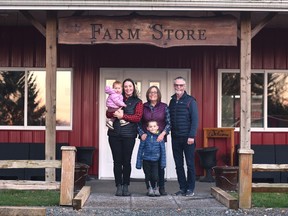 Mark and Kathy Robbins with daughter Jill Azanza and her children. K&M Farms is not selling its popular pasture-raised turkey this Christmas due to processing problems.