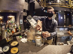 A bartender at Earls Fort McMurray makes a Caesar on Friday, December 11, 2020. COVID-19 restrictions include a shutdown of all in-person dining across Alberta at 12:01 a.m. on Dec. 13. Photo courtesy Robert Murray