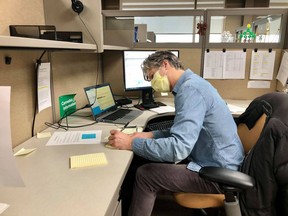 Andy Gravelle, a volunteer contact tracer with Kingston, Frontenac and Lennox and Addington Public Health, completes a volunteer shift at the health unit on Wednesday.