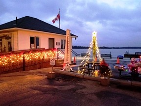 The Customs Dock in Rockport came alive with light and colour as the Friends of Rockport Customs presented its drive by gate lighting and fundraising dinner on December 4.  
Supplied by Janet Gaylord