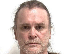 Leonard Brian Cochrane, 51, of Calgary is charged with two counts of first-degree murder in a 26-year-old cold case. Trevor Thomas Deakins, 25, originally of Wiarton, was one of the victims. (Calgary Police Service photo)