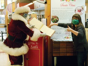 Santa and his elves visited the Beaumont Library on Wednesday, Dec. 2 to install a letterbox so Beaumont kids can send their Christmas wishes to the North Pole.
(Alex Boates)