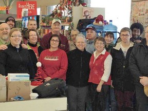 East Ferris Santa Fund volunteers are pictured a few years ago at Perron's Freshmart in Astorville. The 52nd-annual fundraiser for needy families is going ahead a little different this year.
Supplied Photo
