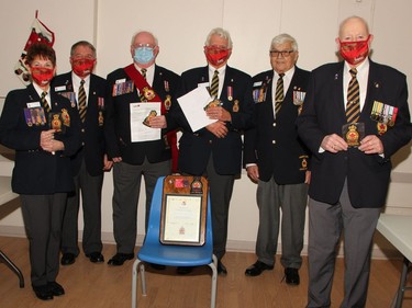 During the honours and awards ceremony at the Pembroke Legion on Nov. 28, a number of lifetime memberships were presented. Taking part in the presentation (from left) were recipient Laurette Halliday, branch president Stan Halliday, recipients Chris Thorbourne and Romeo Levasseur, honours and awards chairman Bob Handspiker and recipient John Henshaw.