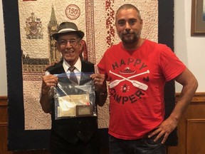 Darcy Major, 86, left, was reunited with a wallet that was missing for 54 years. Christopher Camacho found it recently in an old couch. (CONTRIBUTED)