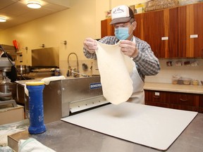 Bill Kukurudz rolls dough for pyrohy at St. Mary's Ukrainian Catholic Church in Sudbury, Ont. St. Mary's is having a Christmas luncheon on December 3, 2020 from 11 a.m. to 1 p.m. with curbside pick-up only.