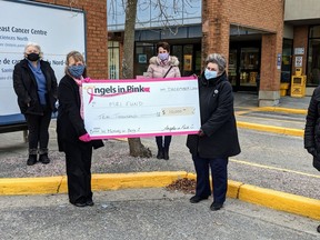 Members of the Northern Cancer Foundation's Angels in Pink Fund alongside sisters of former member Beth are proud to donate $10,000 to the Unlock the Potential MRI Fundraising Campaign at Health Sciences North in Beth's memory. Supplied