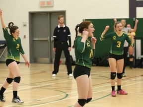Players from Confederation Secondary School celebrate a point during senior girls high school volleyball championship action against Lockerby Vikings at College Boreal in Sudbury, Ont. on Friday February 17, 2017.