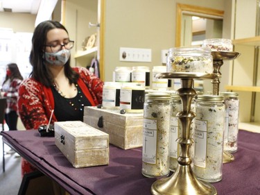 Janna Lizotte, owner of  Moon and Glow, was fixing few items at her booth during the holiday pop-up shop in downtown Timmins Saturday.

RICHA BHOSALE/The Daily Press