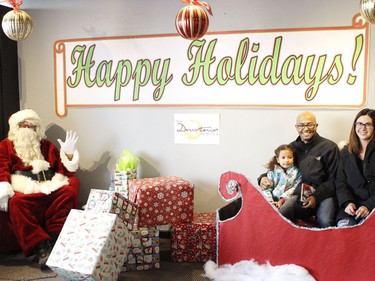 Physical distancing is being followed during photos with Santa. Moiz Tahir is seen here with his daughter Samira and wife Anne Thibodeau, posing for a photo with Santa.

RICHA BHOSALE/The Daily Press