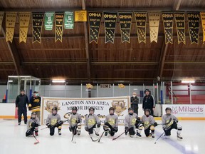 A Langton and Area Minor Hockey Association novice team under some of of the many LAMHA OMHA, Southern Councies and Silver Stick banners. (Chris Abbott/Norfolk and Tillsonburg News)