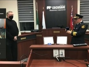 Fire Chief Richard Vallée presents Robert King with the Second Bar to the Fire Services Exemplary Service Medal  in recognition of 40 years of service. Vallée himself received  the Fire Services Exemplary Service Medal in recognition of 20 years of service. Screenshot.TP.jpg