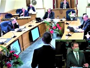 A screengrab of Monday's city council meeting in Belleville shows Coun. Ryan Williams asking Peter Simcisko of Watson & Associates Economists Ltd. about newly proposed development charges. CITY OF BELLEVILLE