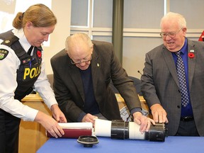 Quinte West OPP Inspector and Detachment Commander Christina Reive, former Trenton Police Chief David Saunders, who passed away Saturday, Dec. 19 at the age of 93, and Mayor Jim Harrison crack open a time capsule last October that was placed in Robert Campney Police Services Building in 1985. That buidling was demolished recently after the new OPP headquarters on Dixon Drive was opened earlier this year.
TIM MEEKS