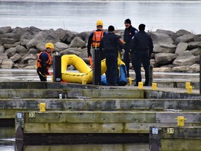 Belleville police and fire personnel were on scene at Meyer's Pier with search-and-rescue gear to conduct a search of an area where two people were reportedly seen on thin ice. DEREK BALDWIN