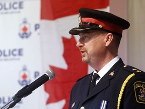 Chris Barry, then an inspector with the Belleville Police Service, speaks during the Nov. 13 promotion ceremony for new chief Mike Callaghan at the Banquet Centre in Belleville. Barry has been promoted to deputy chief starting Jan. 1.