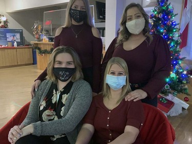 Taylor Cross (clockwise, from lower left) and sisters Christi, Nikki and Kaci Grosvold, past International Villages Ambassadors representing the Polish Hall on Pearl Street,  were among the volunteers to help with Breakfast with Santa at the hall on Sunday morning. Vincent Ball