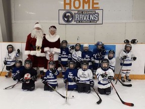 Younger players from the St. George Minor Hockey Association enjoy a visit from Santa and Mrs. Claus last year. The organization is up and running and hopes to return from the COVID-19 provincial lockdown later in January.