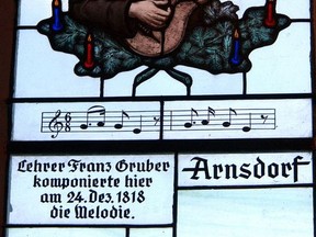 A stained glass window shows a portrait of composer Franz Xaver Gruber at the Silent Night Memorial Chapel in the Austrian village of Oberndorf.