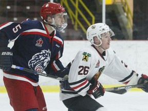 Cornwall defenceman and former Brave Ben Dirven and Brockville forward Troy Bowditch park in front of the Colts net during a CCHL developmental scrimmage at the Memorial Centre on Friday night. The Braves won 2-1 in overtime; the teams meet again in Cornwall on Sunday afternoon.
Tim Ruhnke/The Recorder and Times