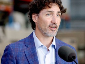 Prime Minister Justin Trudeau speaks at Brockville's 3M tape plant on Aug. 21 to announce a $70-million expansion allowing the site to manufacture N95 masks. (RONALD ZAJAC/The Recorder and Times)