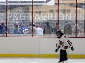 Nick Moore enjoys the ice on the Rotary Pad as a crowd lingers in the background after the official opening of the P&G Pavilion at Rotary Park in downtown Brockville in January 2020. File photo/The Recorder and Times