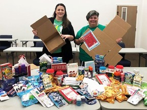 Santa for Seniors project co-organizers Emmalee Morton and Dava Robichaud are shown with a collection of items which will be distributed to seniors in Chatham-Kent later this month.