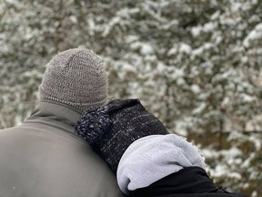 A local resident, who wishes to remain anonymous, is seen here with his daughter, who helped make this Christmas special for him through The Gift.