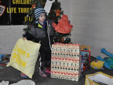 Logan also received several personalized gifts, such as a yellow pillow with his name on it. Photo taken on Saturday December 12, 2020 in Cornwall, Ont. Francis Racine/Cornwall Standard-Freeholder/Postmedia Network