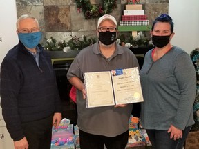 MPP Jim McDonell (left) with The Happy Popcorn Co. owners, Bill Halman and Kristin Davey.Handout/Cornwall Standard-Freeholder/Postmedia Network

Handout Not For Resale