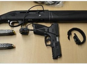 In June 2020, officers charged a traveller under the Customs Act when he failed to declare a handgun, a restricted shotgun, two prohibited magazines, and a device concealing a blade. Photo © Canada Border Services Agency.