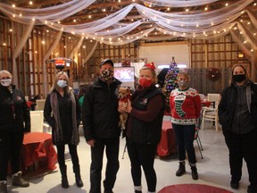 StoneCropAcres owners Marc Gervais and Norene Hyatt-Gervais (with Jeannie) in foreground, along with some of the team members in one of the buildings at the popular attraction just outside Morrisburg. Photo on Sunday, December 20, 2020, in Morrisburg, Ont. Todd Hambleton/Cornwall Standard-Freeholder/Postmedia Network