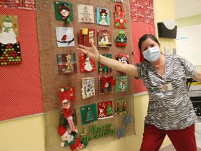 Housekeeping team lead Lois Evrall introducing the 24 Days of Christmas display. Photo on Tuesday, December 22, 2020, in Alexandria, Ont. Todd Hambleton/Cornwall Standard-Freeholder/Postmedia Network