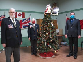 From left at the Royal Canadian Legion Branch 297 in Cornwall are president Marvin Plumadore, first vice-president Dona McNish, and MP Eric Duncan. Photo on Wednesday, December 23, 2020, in Cornwall, Ont. Todd Hambleton/Cornwall Standard-Freeholder/Postmedia Network