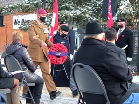 Warrant officer Nathan Reeves of the British Army approaches Cochrane's cenotaph to place a wreath as part of the Remembrance Day proceedings on November 11, 2020. Patrick Gibson/Cochrane Times