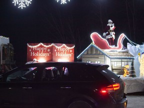 Santa Claus waves to people at the Santa Claus Parade on Saturday, December 5, 2020. Supplied Image/Robert Murray