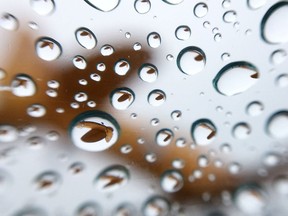 Rain drops on a windshield refract an image of the Harvard aircraft at the the Lt. Robert Hampton Gray memorial next to the Royal Canadian Air Force Association 416 Wing Kingston at the airport in Kingston, Ont. on Tuesday, March 10, 2020.  Elliot Ferguson/The Whig-Standard/Postmedia Network