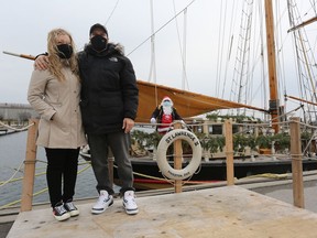 Maureen and Ruben Silva drove from Ottawa to get their photo taken with Santa and the St. Lawrence II tall ship in Portsmouth Olympic Harbour on Saturday.