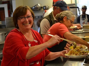 Executive sirector Ronda Candy enjoying the kitchen at Martha's Table.