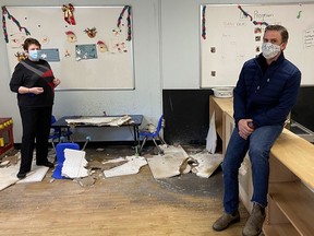 Donna Vinkle, acting executive director of Kingston Literacy and Skills, and David Weese, vice-president of the non-profit's board of directors, are seen Monday in the organization's daycare centre at 16 Bath Rd. The building suffered smoke damage following a fire on Dec. 8 that destroyed the indoor flea market next door.