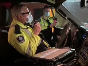 Graham Christie, a paramedic with the Hastings-Quinte Paramedic Services, signs off after a 50-year career, the first 36 years spent in the Kingston and Frontenac County area, on Dec. 17.