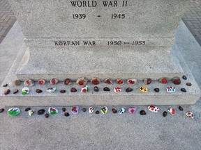 Students painted 100 rocks – one for each of the 100 years – and placed them on the base of the monument on November 22 as part of the celebrations of the 100th anniversary of the war memorial in Town Hall Park.  Supplied by Janet Gaylord